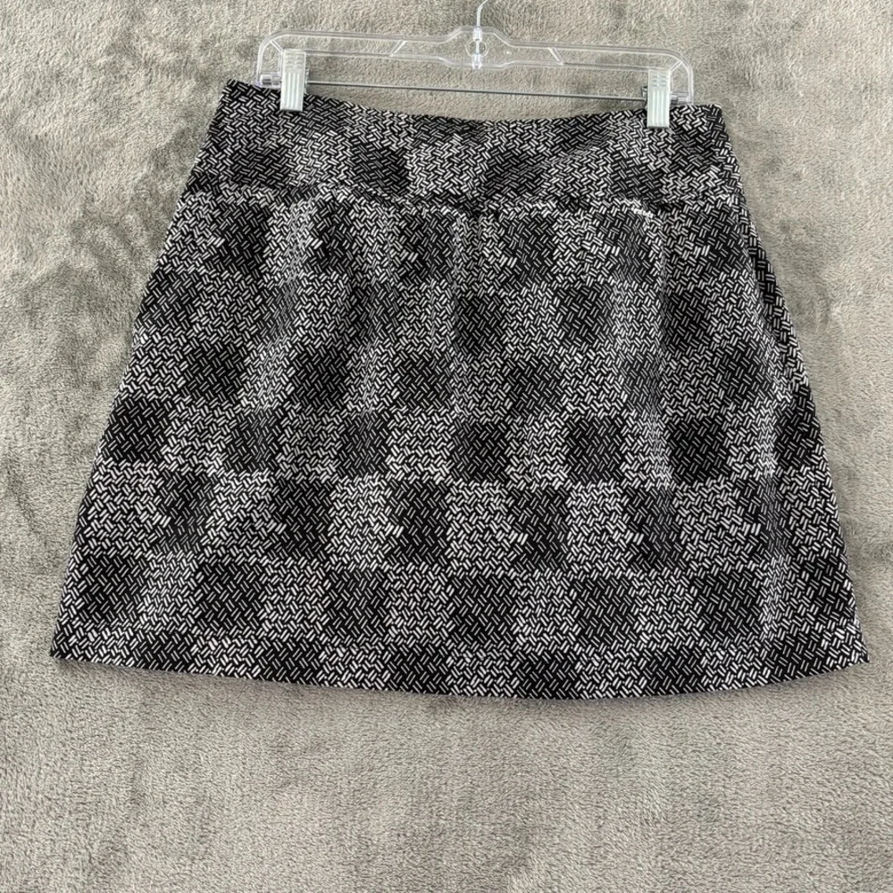 Izod XFG Golf Skort Womens 8 Black White Check Kick Pleat Pocket Stretch Zip‎